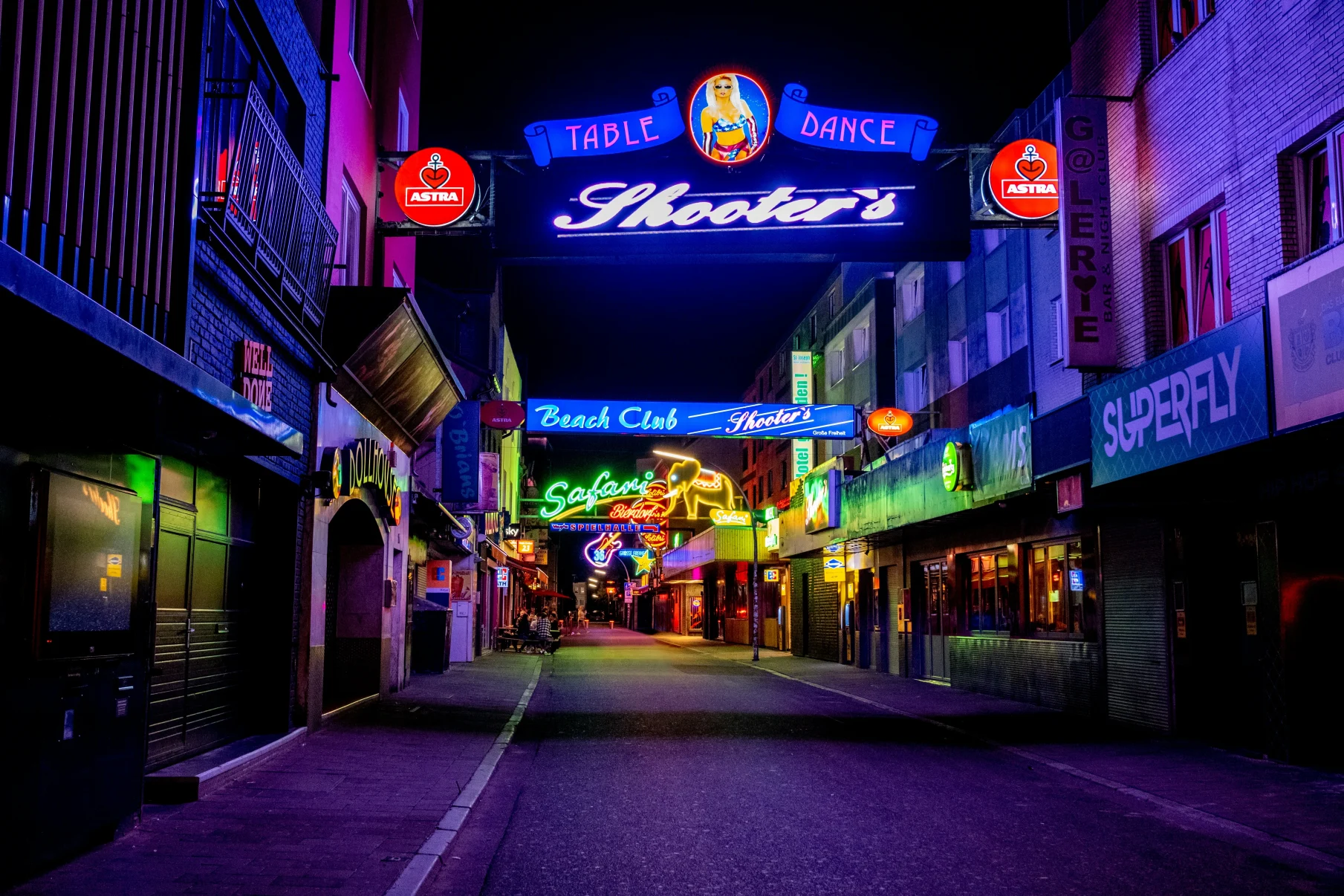 Street with neon lights at night