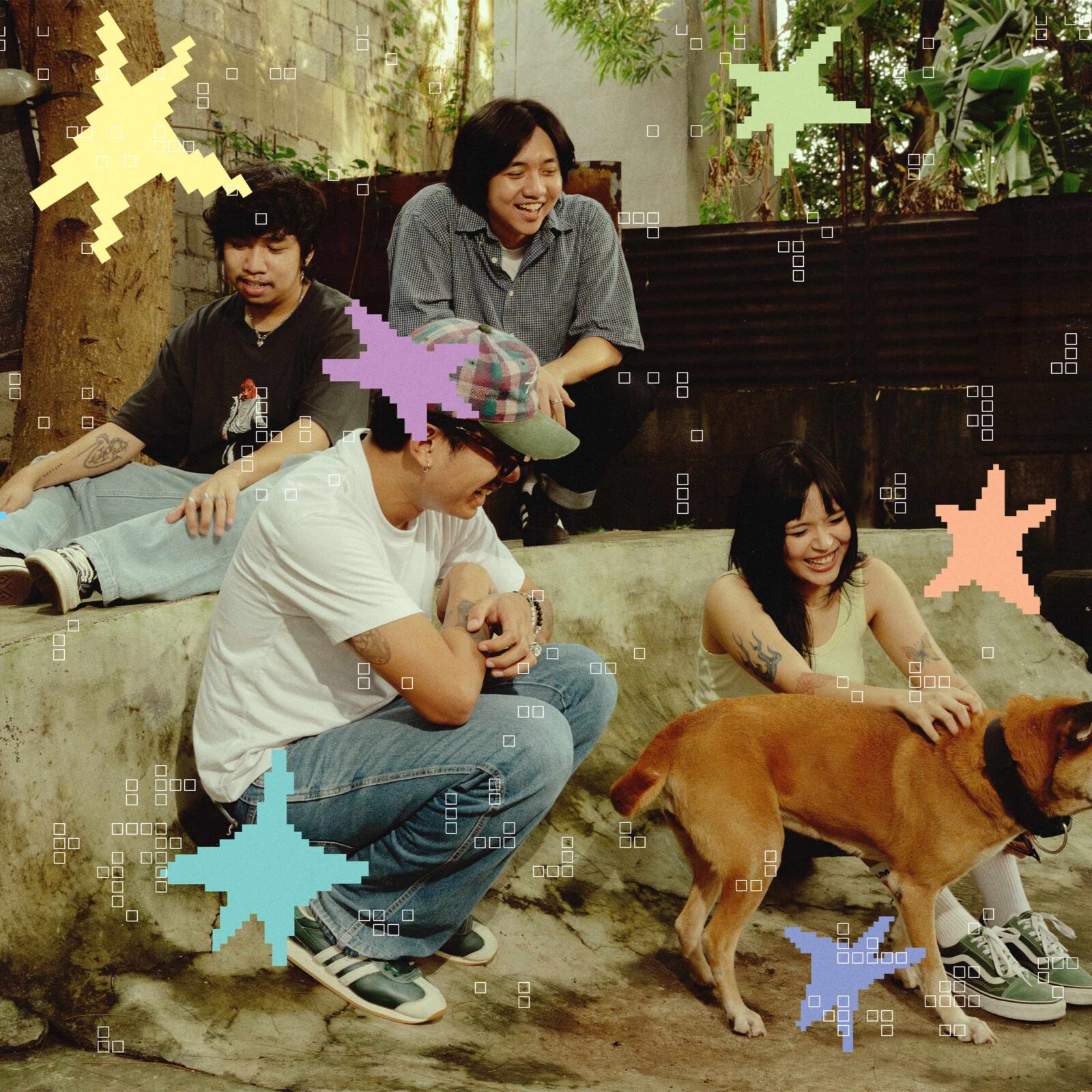 Four friends relaxing outdoors near a concrete ledge with a brown dog, sharing smiles in a casual, sunny setting.