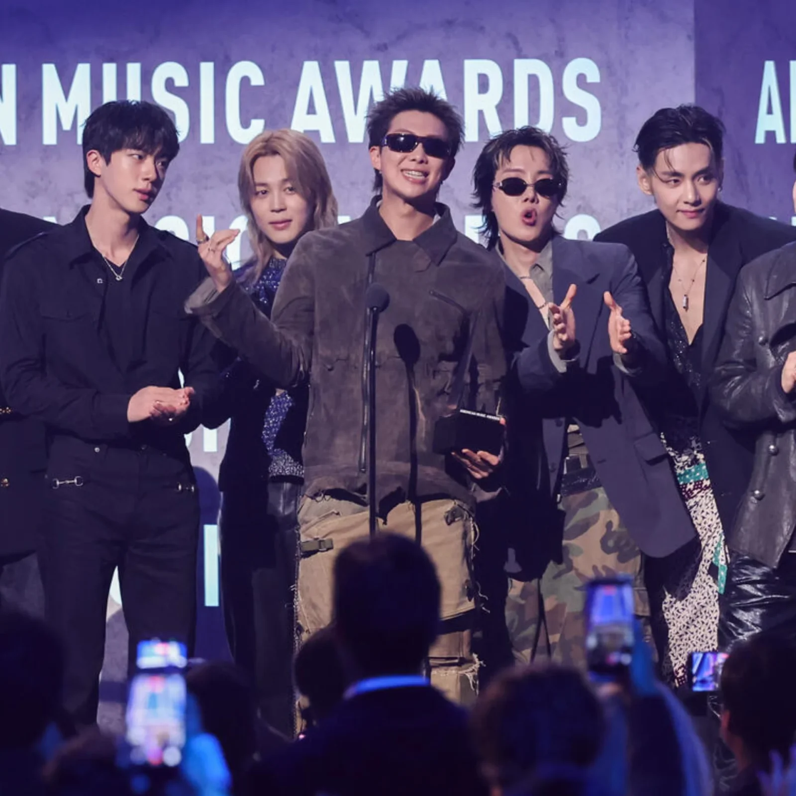BTS receiving their 'Artist of the Year' award at the 2026 American Music Awards