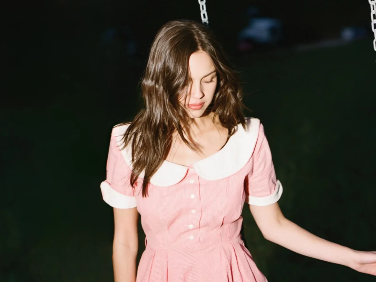 Olivia Rodrigo in a pink dress for 'you seem pretty sad for a girl so in love'