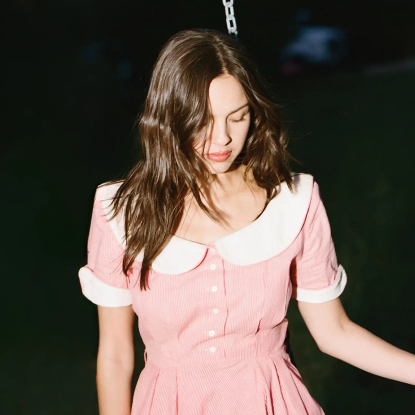Olivia Rodrigo in a pink dress for 'you seem pretty sad for a girl so in love'